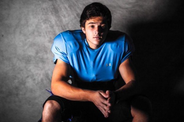 Calum Down-Jones in his newly-purchased football gear (Photo by Garrett Falke)