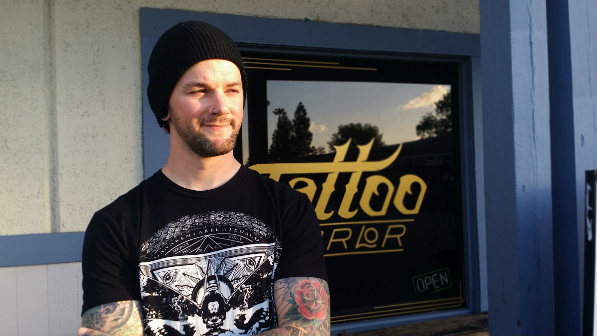 "Without my heart taking a crap on me, I wouldn't be where I am today," says Kyle Blackburn, head piercer and tattoo apprentice at True at Heart Tattoo Shop. (Photo by: Jenna Sergeant)