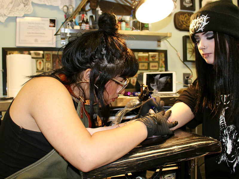 Sanchez and her client focused on their current project. (Ashley Hern)