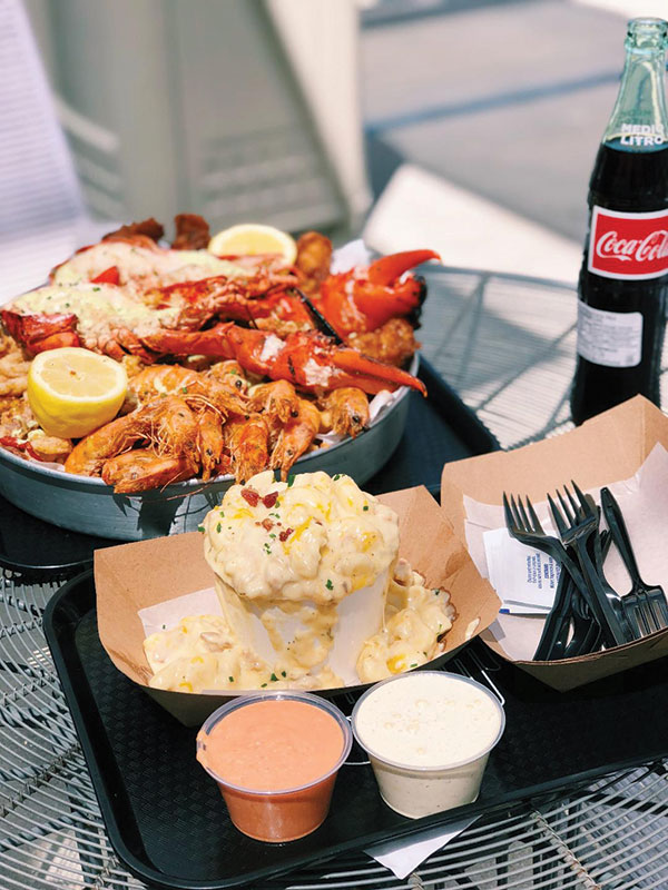 A seafood delight with loaded mashed potatoes is an option at the restaurant Portside at the Trade Food Hall in Irvine. (Kristin Torres)