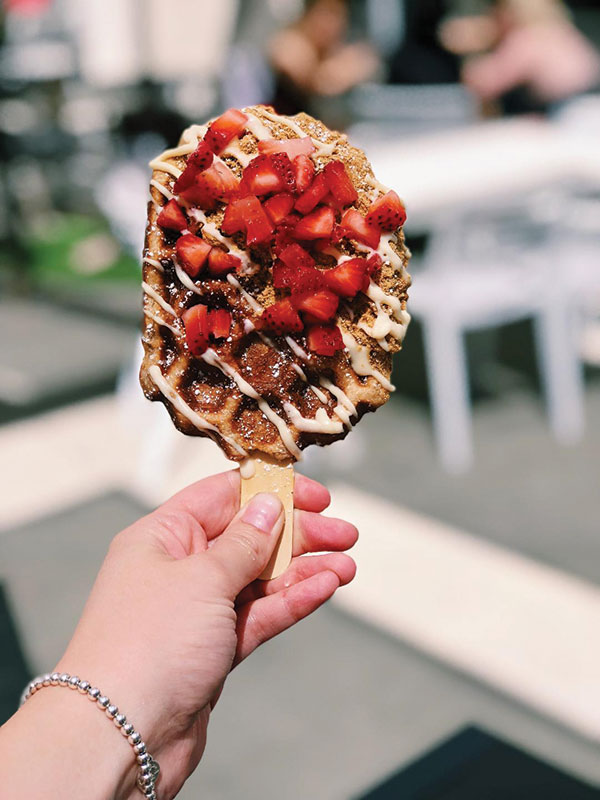 Belgium Liege waffles are a traditional street food that's typically eaten with your hand at Sweet Combforts at the Trade Food Hall in Irvine. (Kristin Torres)